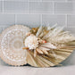 Dried floral wall hanging