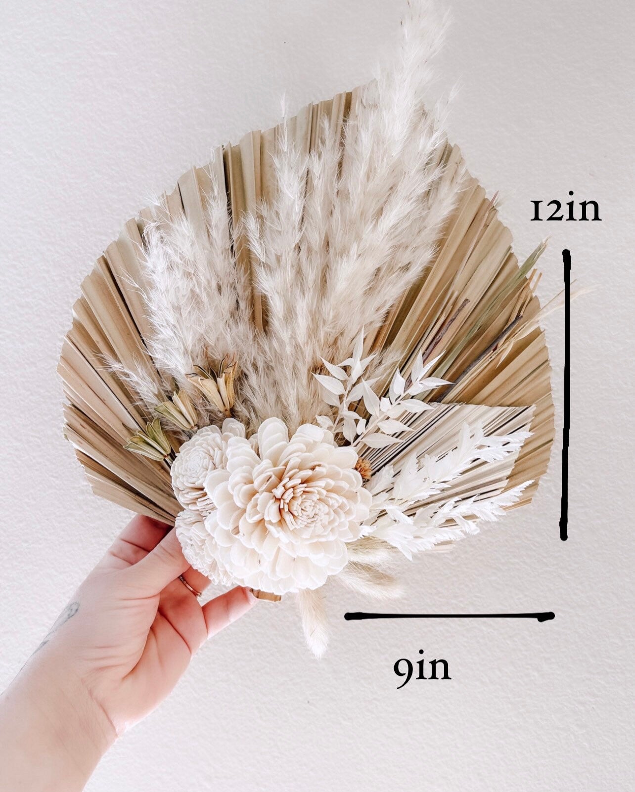 Dried floral wall hanging