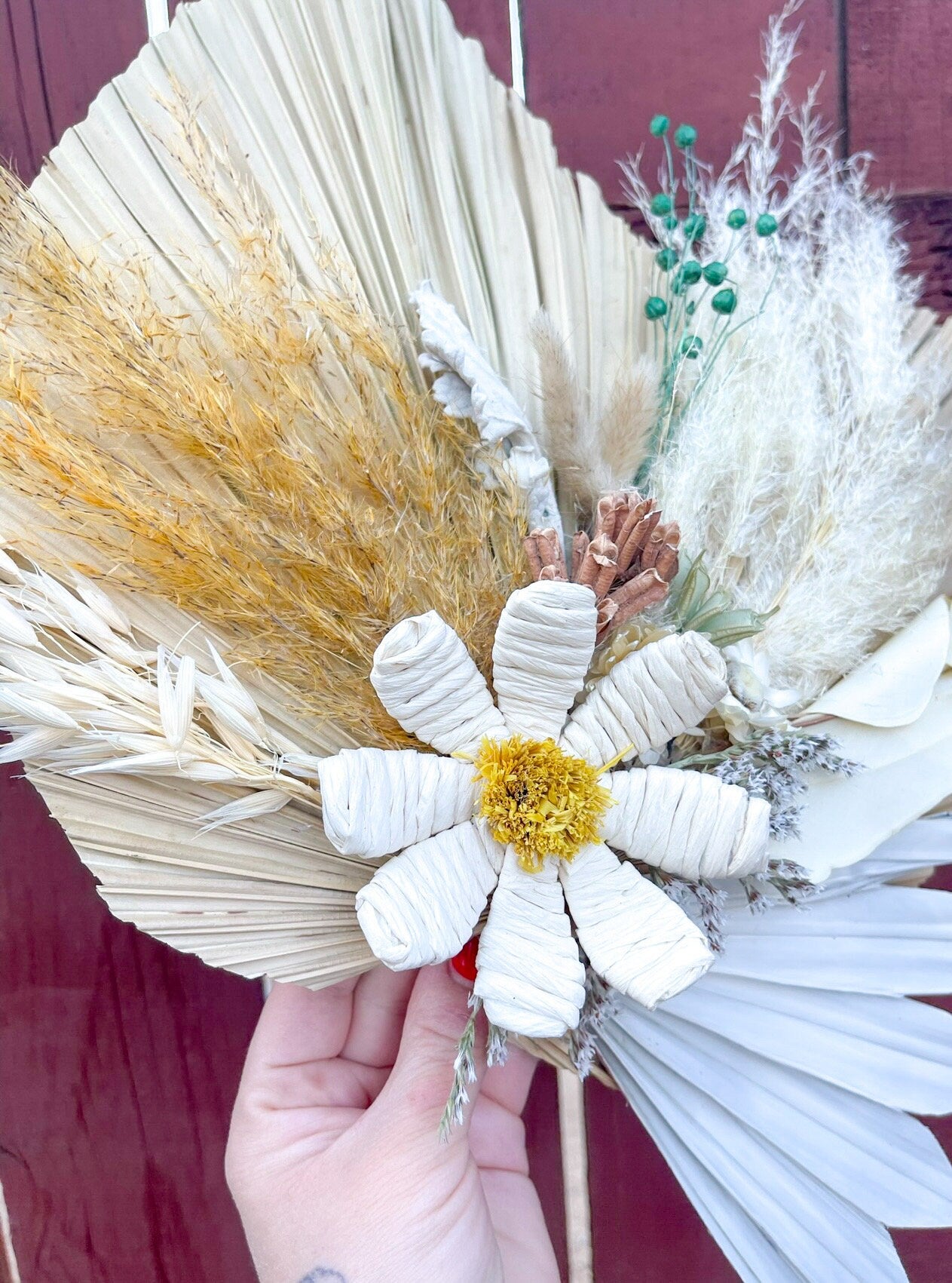 Dried floral palm wall hanging